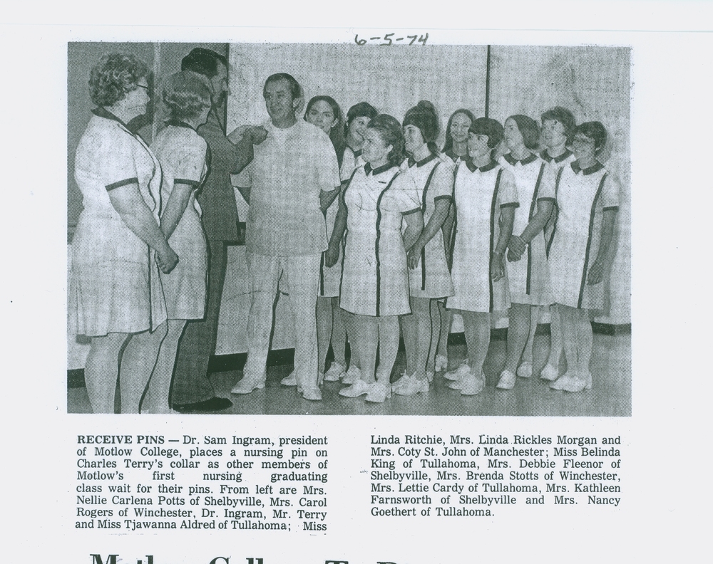 Newspaper image of Motlow President, Dr. Sam Ingram, pinning the first class of graduates from the newly established Nursing program. Graduates in the photo are: Nellie Carlena Potts, Carol Rogers, Terry Aldred, Tjawanna Aldred, Linda Ritchie, Linda Rickl